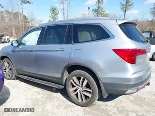 2017 Honda Pilot Touring with VIN 5FNYF6H94HB006873, listed as a IAAI auction lot 41618529 with 154,689 mi miles. Bid and sale history available at carsss.com. Image 14.