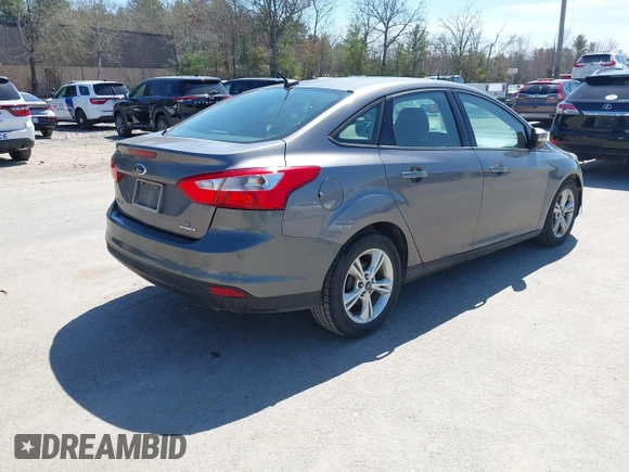 2013 Ford Focus SE with VIN 1FADP3F23DL355181, listed as a IAAI auction lot 42103742 with 171,594 mi miles. Bid and sale history available at carsss.com. Image 4.