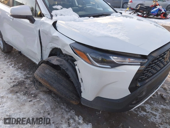 2024 Toyota Corolla Cross LE with VIN 7MUBAABG0RV097884, listed as a IAAI auction lot 41447543 with 8,396 mi miles and . Bid and sale history available at DreamBid. Image 6.
