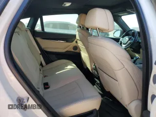 2018 BMW X6 sDrive35i with VIN 5UXKU0C5XJ0G69741, listed as a Copart auction lot 77366934 with 66,287 mi miles and Salvage Title. Bid and sale history available at carsss.com. Image 11.
