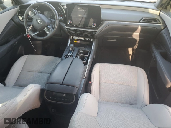2024 Lexus TX 350 with VIN 5TDAAAB63RS002392, listed as a Copart auction lot 65291525 with 62,857 mi miles and Salvage title. Bid and sale history available at DreamBid. Image 8.
