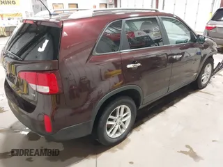 2015 Kia Sorento LX with VIN 5XYKTDA70FG646886, listed as a IAAI auction lot 42469491 with 214,232 mi miles and . Bid and sale history available at DreamBid. Image 4.