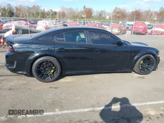 2020 Dodge Charger SRT Hellcat z VIN 2C3CDXL91LH128675, wystawiony jako IAAI lot #40805177 z przebiegiem 43 619 mil mil oraz . Historia ofert i sprzedaży dostępna na DreamBid. Obrazek 13.