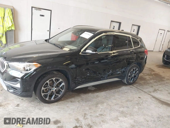 2022 BMW X1 xDrive28i with VIN WBXJG9C09N5U69567, listed as a IAAI auction lot 42273644 with 36,944 mi miles and . Bid and sale history available at DreamBid. Image 6.