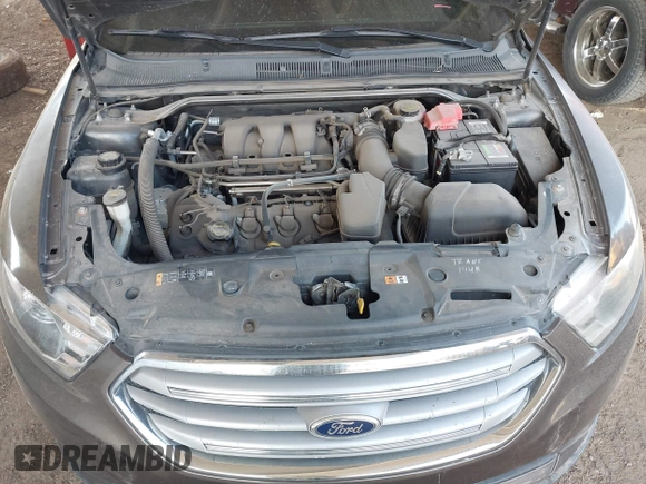 2015 Ford Taurus SEL with VIN 1FAHP2H87FG176103, listed as a IAAI auction lot 41950844 with 205,014 mi miles. Bid and sale history available at carsss.com. Image 10.