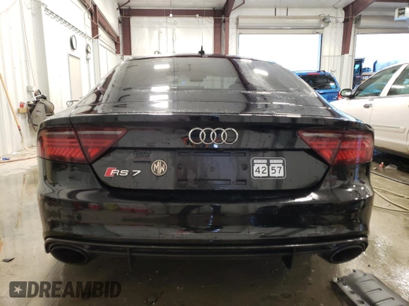 2016 Audi RS 7 Prestige z VIN WUAW2AFC0GN903129, wystawiony jako Copart lot #41250974 z przebiegiem 96 619 mil mil oraz . Historia ofert i sprzedaży dostępna na DreamBid. Obrazek 6.