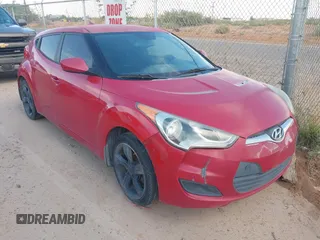 2013 Hyundai Veloster w/Black Int with VIN KMHTC6AD7DU175221, listed as a IAAI auction lot 42625473 with 181,037 mi miles and . Bid and sale history available at DreamBid. Image 1.