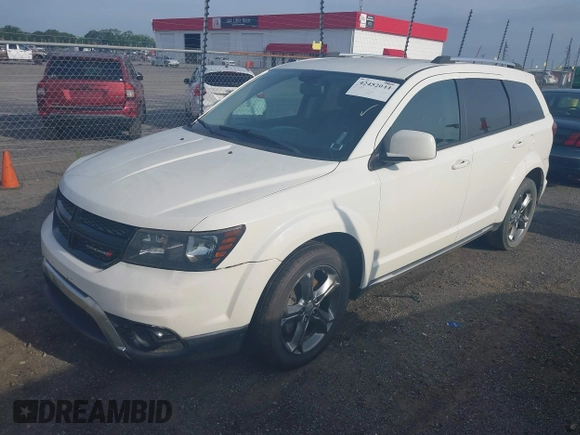 2015 Dodge Journey Crossroad with VIN 3C4PDCGG6FT588666, listed as a IAAI auction lot 42452044 with 238,566 mi miles and . Bid and sale history available at DreamBid. Image 2.