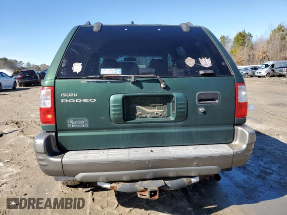 2002 Isuzu Rodeo S z VIN 4S2CK58W724334510, wystawiony jako Copart lot #45355875 z przebiegiem 121 884 mil mil oraz Tytuł czysty. Historia ofert i sprzedaży dostępna na DreamBid. Obrazek 6.
