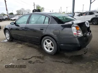 2004 Nissan Altima with VIN 1N4AL11D54C193517, listed as a Copart auction lot 56189985 with 210,451 mi miles and Salvage title. Bid and sale history available at DreamBid. Image 2.