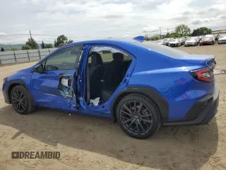 2023 Subaru WRX Premium with VIN JF1VBAF65P9824749, listed as a Copart auction lot 52210825 with 4,965 mi miles and Salvage title. Bid and sale history available at DreamBid. Image 2.