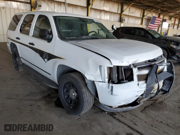 2012 Chevrolet Tahoe Commercial with VIN 1GNLC2E00CR295536, listed as a Copart auction lot 53904535 with 140,719 mi miles and Salvage title. Bid and sale history available at DreamBid. Image 4.