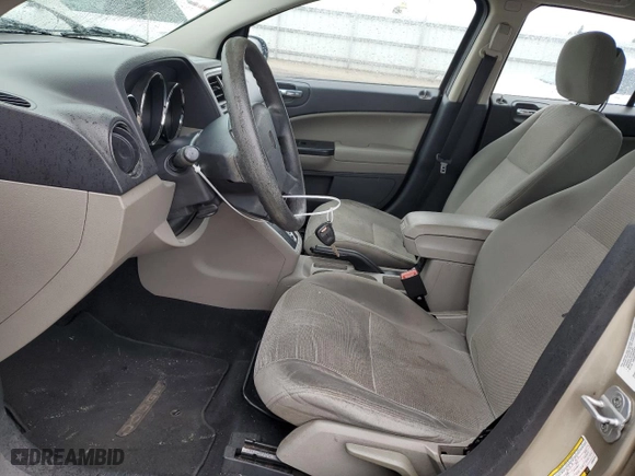2010 Dodge Caliber SXT with VIN 1B3CB4HA3AD586765, listed as a Copart auction lot 49103085 with 143,509 mi miles and Salvage Title. Bid and sale history available at carsss.com. Image 7.
