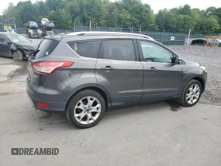 2016 Ford Escape Titanium with VIN 1FMCU9J90GUA01974, listed as a Copart auction lot 60376265 with 177,384 mi miles and Salvage title. Bid and sale history available at DreamBid. Image 3.