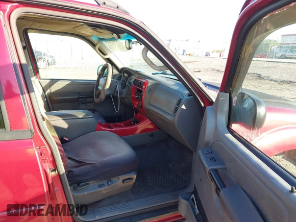 2004 Ford Explorer Sport Trac XLS z VIN 1FMZU67K64UC21974, wystawiony jako IAAI lot #42017439 z przebiegiem 193 613 mil mil oraz . Historia ofert i sprzedaży dostępna na DreamBid. Obrazek 5.
