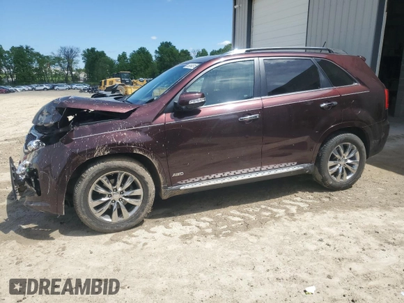 2012 Kia Sorento SX z VIN 5XYKWDA29CG301363, wystawiony jako Copart lot #55954815 z przebiegiem 83 206 mil mil oraz Szkoda całkowita • Salvage title. Historia ofert i sprzedaży dostępna na DreamBid. Obrazek 1.