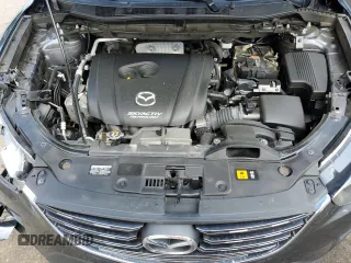 2016 Mazda CX-5 Sport z VIN JM3KE2BY4G0632946, wystawiony jako Copart lot #61447435 z przebiegiem 178 492 mil mil oraz Szkoda całkowita • Salvage title. Historia ofert i sprzedaży dostępna na DreamBid. Obrazek 12.