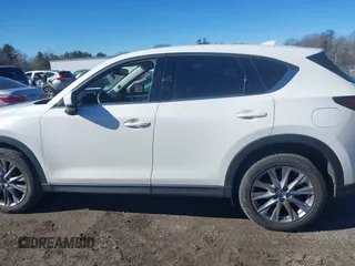 2019 Mazda CX-5 Grand Touring with VIN JM3KFBDM2K0672720, listed as a IAAI auction lot 41751196 with 51,632 mi miles and . Bid and sale history available at carsss.com. Image 14.