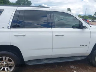 2016 Chevrolet Tahoe LT with VIN 1GNSKBKC0GR227451, listed as a IAAI auction lot 42241120 with 243,354 mi miles and . Bid and sale history available at DreamBid. Image 13.