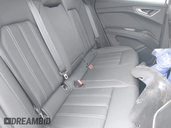 2024 Audi Q4 e-tron Premium Plus with VIN WA1LUBFZ0RP034490, listed as a IAAI auction lot 41382884 with 738 mi miles and . Bid and sale history available at DreamBid. Image 8.