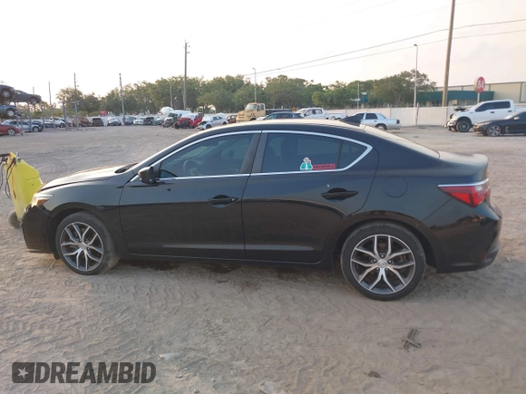 2019 Acura ILX Premium with VIN 19UDE2F7XKA001786, listed as a IAAI auction lot 42040373 with 74,586 mi miles and . Bid and sale history available at DreamBid. Image 14.