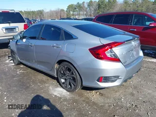 2019 Honda Civic Sport with VIN 2HGFC2F85KH605786, listed as a IAAI auction lot 41621480 with 66,438 mi miles and . Bid and sale history available at DreamBid. Image 3.