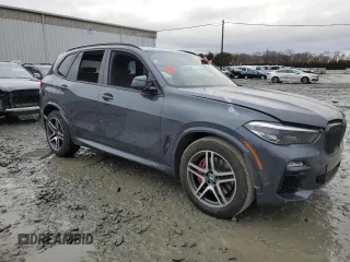 2021 BMW X5 z VIN NJ1541E, wystawiony jako Copart lot #37990264 z przebiegiem 18 321 mil mil oraz Szkoda całkowita • Salvage title. Historia ofert i sprzedaży dostępna na DreamBid. Obrazek 4.