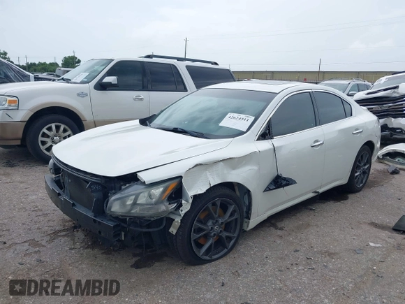 2014 Nissan Maxima S with VIN 1N4AA5AP6EC908751, listed as a IAAI auction lot 42624511 with 141,544 mi miles and . Bid and sale history available at DreamBid. Image 18.
