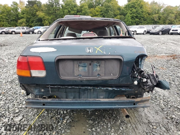 1997 Honda Civic DX with VIN JHMEJ6624VS038386, listed as a Copart auction lot 71541574 with 385,295 mi miles and Salvage Title. Bid and sale history available at carsss.com. Image 6.