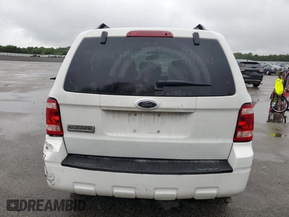 2009 Ford Escape Hybrid with VIN 1FMCU59349KC24624, listed as a Copart auction lot 65111425 with 217,756 mi miles and Non repairable. Bid and sale history available at DreamBid. Image 6.