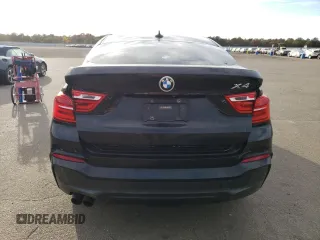 2016 BMW X4 xDrive28i with VIN 5UXXW3C55G0R22729, listed as a Copart auction lot 72906833 with 98,668 mi miles. Bid and sale history available at carsss.com. Image 6.