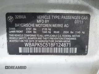 2011 BMW 3 Series 328i xDrive with VIN WBAPK5C51BF124871, listed as a IAAI auction lot 42081999 with 129,120 mi miles. Bid and sale history available at carsss.com. Image 9.