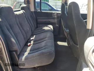 2001 Dodge Dakota Sport z VIN 1B7GG2AN81S113605, wystawiony jako Copart lot #58990065 z przebiegiem 243 919 mil mil oraz Tytuł czysty. Historia ofert i sprzedaży dostępna na DreamBid. Obrazek 10.