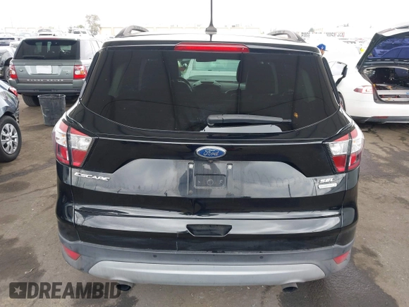 2018 Ford Escape SEL with VIN 1FMCU0HD6JUA86266, listed as a IAAI auction lot 42031613 with 72,798 mi miles and . Bid and sale history available at carsss.com. Image 16.