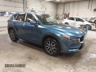 2018 Mazda CX-5 S Premium with VIN JM3KFBDMXJ1376045, listed as a IAAI auction lot 41813968 with 90,378 mi miles and . Bid and sale history available at DreamBid. Image 1.
