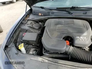 2020 Dodge Charger SXT z VIN 2C3CDXBG0LH124858, wystawiony jako Copart lot #85275325 z przebiegiem 99 280 mil mil oraz Szkoda całkowita • Salvage title. Historia ofert i sprzedaży dostępna na DreamBid. Obrazek 14.