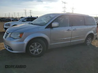 2012 Chrysler Town & Country Touring z VIN 2C4RC1BG2CR127373, wystawiony jako Copart lot #77104484 z przebiegiem 138 263 mil mil oraz Szkody całkowita. Historia ofert i sprzedaży dostępna na DreamBid. Obrazek 1.