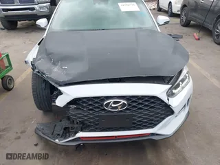 2019 Hyundai Veloster Turbo with VIN KMHTH6AB3KU020193, listed as a IAAI auction lot 41526722 with 54,697 mi miles. Bid and sale history available at carsss.com. Image 12.