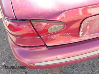 1995 Ford Contour z VIN 3FALP65L4SM120176, wystawiony jako IAAI lot #41744833 z przebiegiem 176 764 mil mil oraz . Historia ofert i sprzedaży dostępna na DreamBid. Obrazek 6.