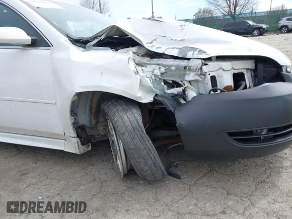 2014 Chevrolet Impala LS with VIN 2G1WA5E38E1141734, listed as a IAAI auction lot 41942551 with 110,805 mi miles and . Bid and sale history available at DreamBid. Image 6.