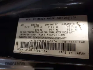 2012 Mazda Mazda3 i Touring with VIN JM1BL1V88C1540974, listed as a IAAI auction lot 41809430 with 121,334 mi miles. Bid and sale history available at carsss.com. Image 9.