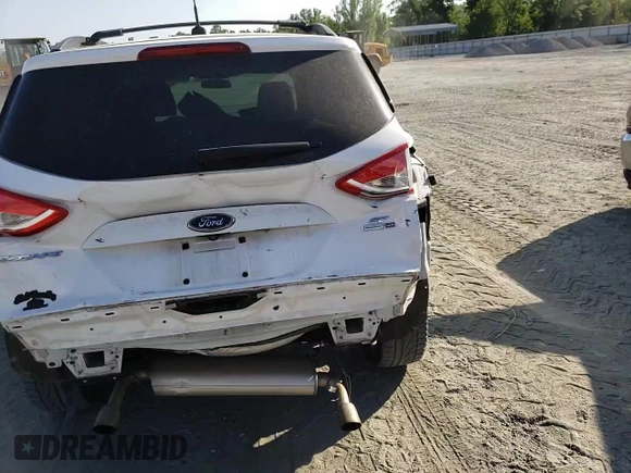 2014 Ford Escape SE with VIN 1FMCU9GX1EUC89846, listed as a Copart auction lot 56138545 with 107,455 mi miles and Salvage title. Bid and sale history available at DreamBid. Image 14.
