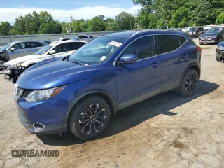 2017 Nissan Rogue SV z VIN JN1BJ1CP0HW004064, wystawiony jako Copart lot #57960265 z przebiegiem 121 981 mil mil oraz Szkoda całkowita • Salvage title. Historia ofert i sprzedaży dostępna na DreamBid. Obrazek 1.