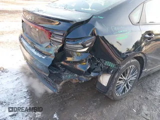 2023 Kia Forte GT-Line z VIN 3KPF54AD2PE534865, wystawiony jako IAAI lot #41417713 z przebiegiem 24 074 mil mil oraz . Historia ofert i sprzedaży dostępna na DreamBid. Obrazek 6.