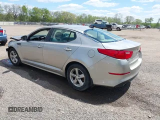 2015 Kia Optima LX z VIN 5XXGM4A70FG392359, wystawiony jako IAAI lot #42232025 z przebiegiem 192 636 mil mil oraz . Historia ofert i sprzedaży dostępna na DreamBid. Obrazek 3.