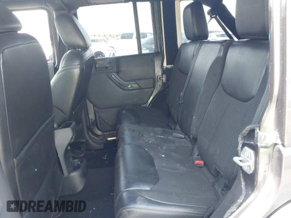 2017 Jeep Wrangler Unlimited Sahara with VIN 1C4BJWEG2HL612421, listed as a IAAI auction lot 42355409 with 81,708 mi miles and . Bid and sale history available at DreamBid. Image 8.
