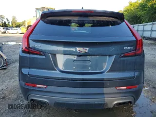 2019 Cadillac XT4 FWD Premium Luxury z VIN 1GYFZCR47KF123621, wystawiony jako Copart lot #69766894 z przebiegiem 68 191 mil mil oraz Szkody całkowita. Historia ofert i sprzedaży dostępna na DreamBid. Obrazek 6.