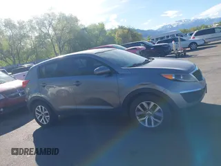2016 Kia Sportage LX with VIN KNDPBCAC9G7840928, listed as a IAAI auction lot 42096987 with 211,548 mi miles and . Bid and sale history available at carsss.com. Image 13.