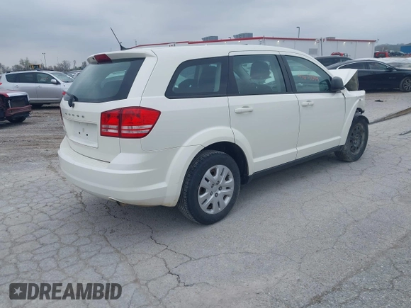 2014 Dodge Journey SE with VIN 3C4PDCAB7ET134454, listed as a IAAI auction lot 41966206 with 145,814 mi miles and . Bid and sale history available at DreamBid. Image 4.