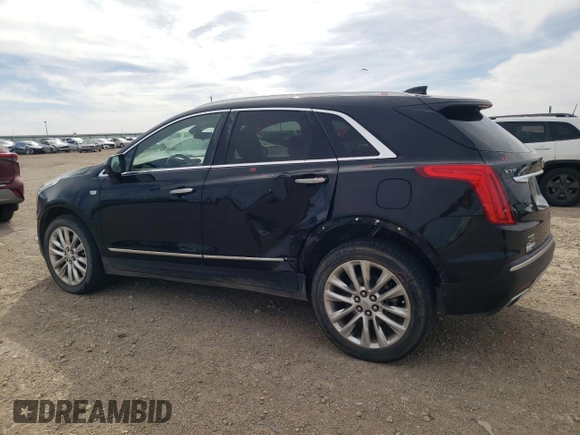 2017 Cadillac XT5 Platinum AWD z VIN 1GYKNFRS1HZ283589, wystawiony jako Copart lot #49140565 z przebiegiem 77 900 mil mil oraz Szkoda całkowita • Salvage title. Historia ofert i sprzedaży dostępna na DreamBid. Obrazek 2.